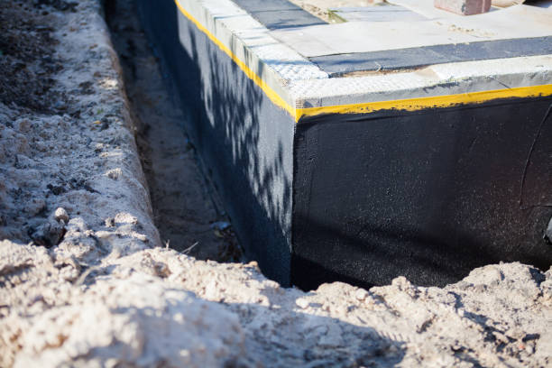 Professional Waterproofing technician working in Warren, PA